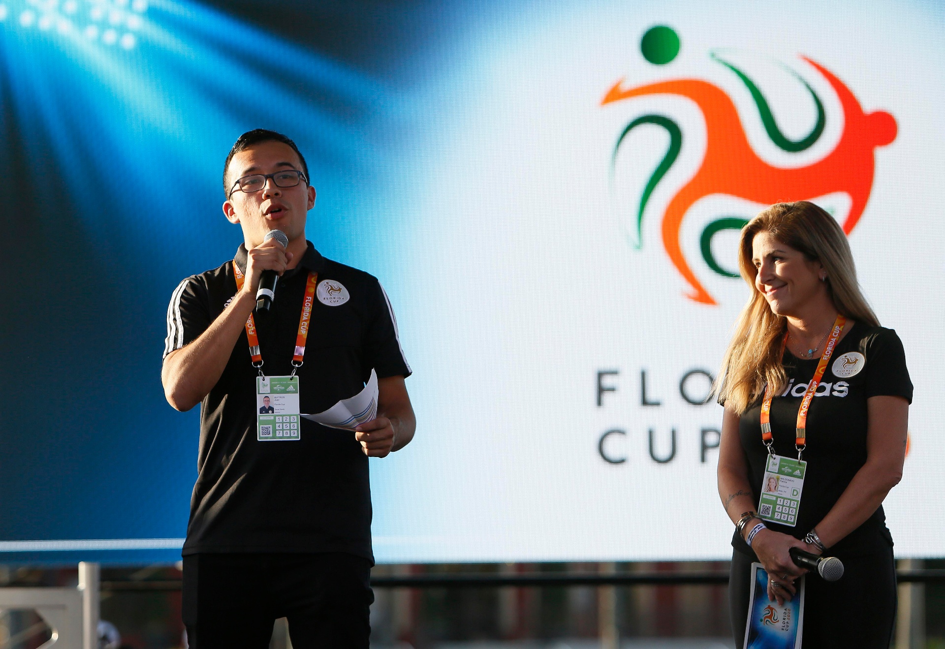 Juan Buitron speaking on stage at the Florida Cup.